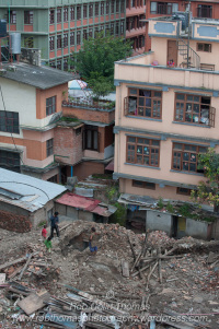 Family recovering and removing materials from a building destroyed in the Nepal Earthquake of 25th April 2015. 